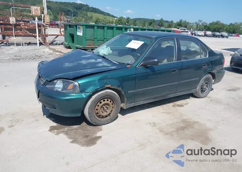 1999 Honda Civic Lx z USA, uszkodzony, nr VIN 2HGEJ6670XH535122
